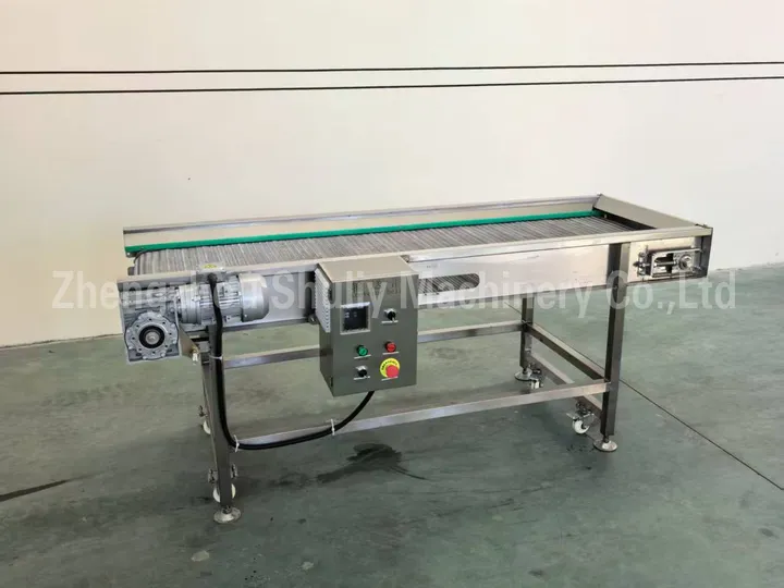 Máy chiên gà viên tự động cấp liệu