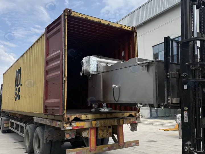 Loading the Continuous Frying Machine